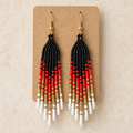 Black, Red, Gold, White Hombre